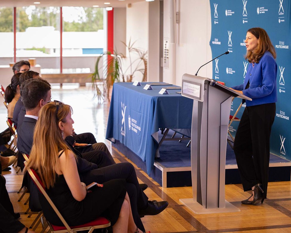 Laura Chaubard is talking to an audience at the inauguration of the Chair